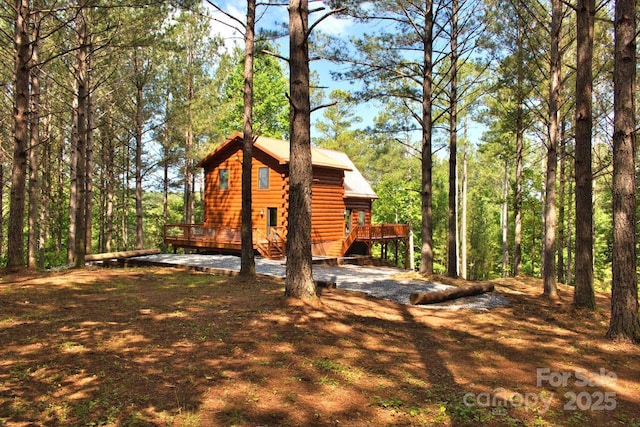 317 Knightsbridge Cir, Union Mills, NC 28167 - view of side of property featuring a deck
