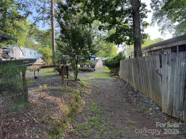 160/162 Arrowood Trl Unit F28/F29, Mount Gilead, NC 27306 - view of yard featuring a storage shed