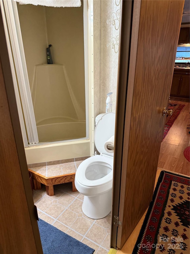 160/162 Arrowood Trl Unit F28/F29, Mount Gilead, NC 27306 - full bathroom with toilet, a shower, and tile patterned flooring