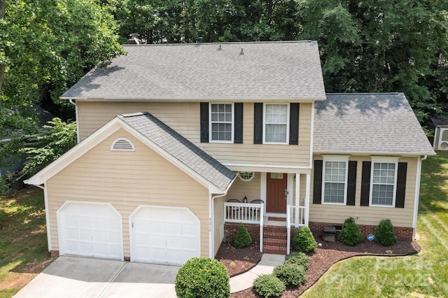 7212 Morsey Ct, Charlotte, NC 28269 - view of front of property featuring covered porch, driveway, an attached garage, and roof with shingles