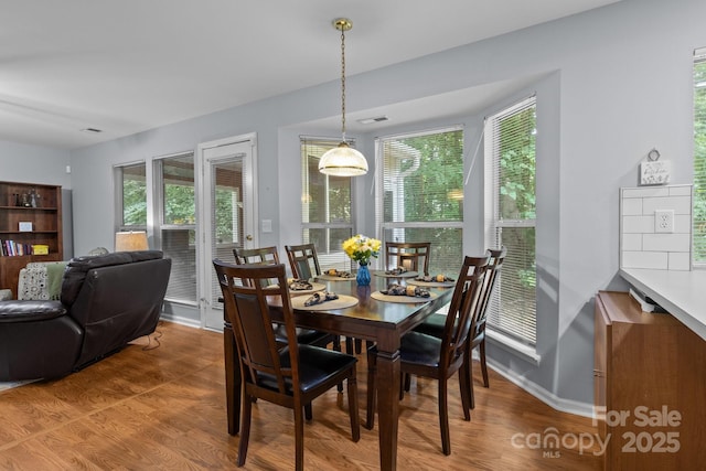 7212 Morsey Ct, Charlotte, NC 28269 - dining space featuring wood finished floors and baseboards