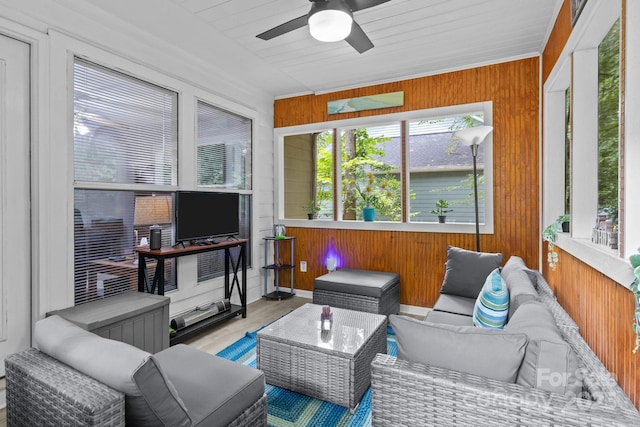 7212 Morsey Ct, Charlotte, NC 28269 - sunroom featuring wooden walls, an outdoor living space, ceiling fan, and wood finished floors