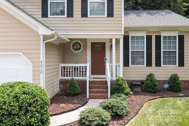 7212 Morsey Ct, Charlotte, NC 28269 - doorway to property featuring a porch and a shingled roof