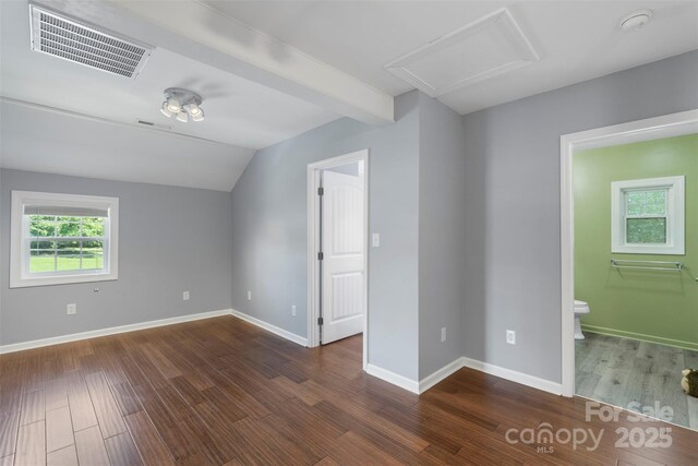 202 Glenn Ave, Kannapolis, NC 28081 - empty room with wood finished floors, a smoke detector, and lofted ceiling