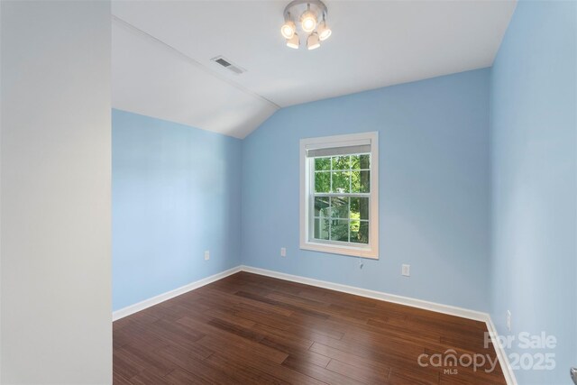 202 Glenn Ave, Kannapolis, NC 28081 - empty room featuring lofted ceiling and dark wood finished floors