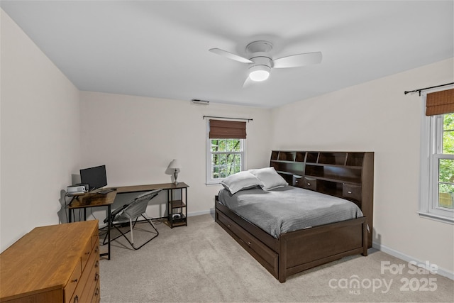2917 Rustic Ln, Charlotte, NC 28210 - carpeted bedroom featuring an office area and ceiling fan