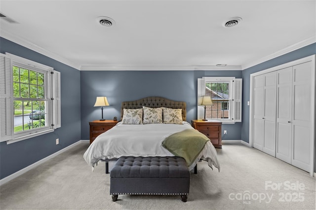 2917 Rustic Ln, Charlotte, NC 28210 - carpeted bedroom featuring multiple windows, ornamental molding, and a closet