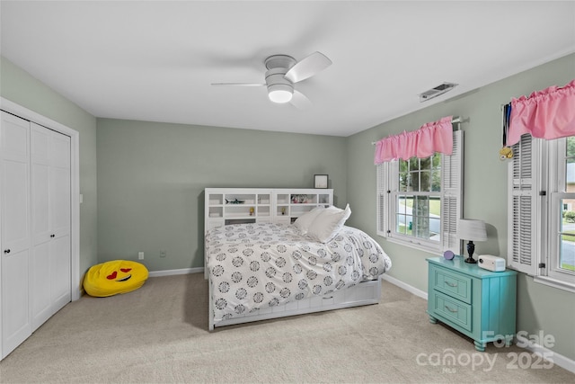 2917 Rustic Ln, Charlotte, NC 28210 - carpeted bedroom with a closet and ceiling fan