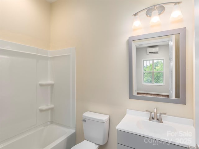 558 Liner Cove Rd, Waynesville, NC 28786 - full bath with a wall unit AC, vanity, and shower / washtub combination