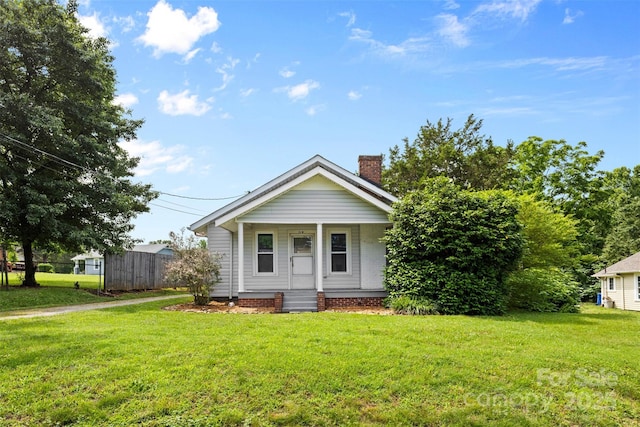 2519 2nd Ave SW, Hickory, NC 28602 - view of front of house with a chimney and covered porch