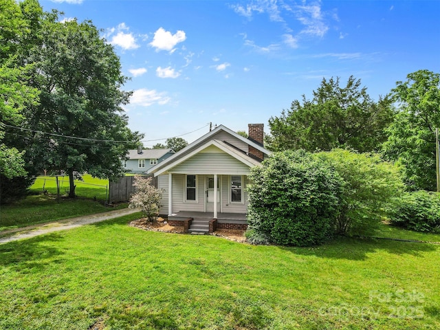 2519 2nd Ave SW, Hickory, NC 28602 - view of front of house with a porch and a chimney