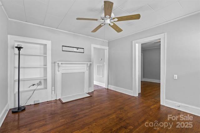 2519 2nd Ave SW, Hickory, NC 28602 - unfurnished living room with ceiling fan, wood finished floors, built in features, and crown molding