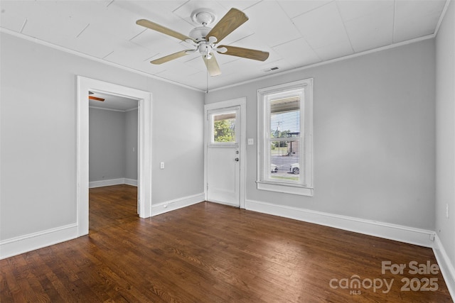 2519 2nd Ave SW, Hickory, NC 28602 - unfurnished room featuring crown molding, a ceiling fan, and dark wood-type flooring
