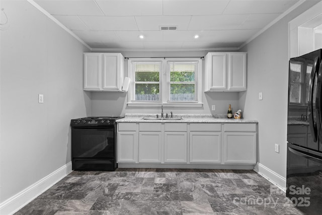 2519 2nd Ave SW, Hickory, NC 28602 - kitchen featuring black appliances, ornamental molding, white cabinetry, and recessed lighting
