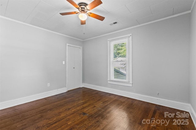 2519 2nd Ave SW, Hickory, NC 28602 - empty room featuring ornamental molding, dark wood-style floors, and ceiling fan