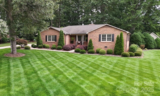 1695 Arden Dr, Lincolnton, NC 28092 - ranch-style home featuring brick siding, a front lawn, and roof with shingles
