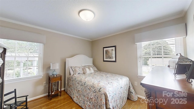 1695 Arden Dr, Lincolnton, NC 28092 - bedroom featuring multiple windows, crown molding, and light wood-style floors