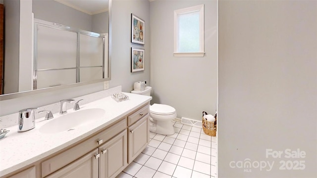 1695 Arden Dr, Lincolnton, NC 28092 - bathroom with a shower with door, vanity, tile patterned floors, and crown molding