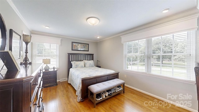 1695 Arden Dr, Lincolnton, NC 28092 - bedroom with crown molding and light wood-style floors
