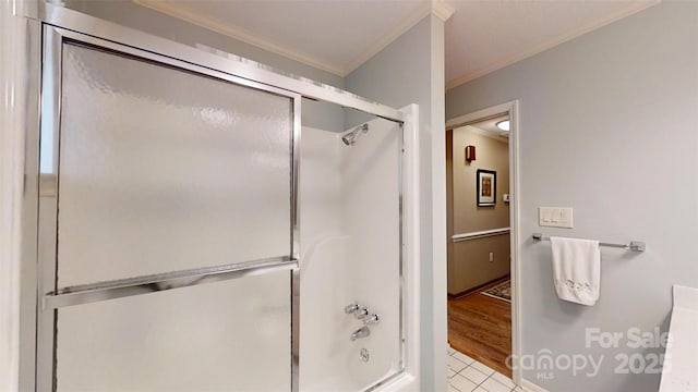 1695 Arden Dr, Lincolnton, NC 28092 - full bathroom with crown molding, enclosed tub / shower combo, and tile patterned floors