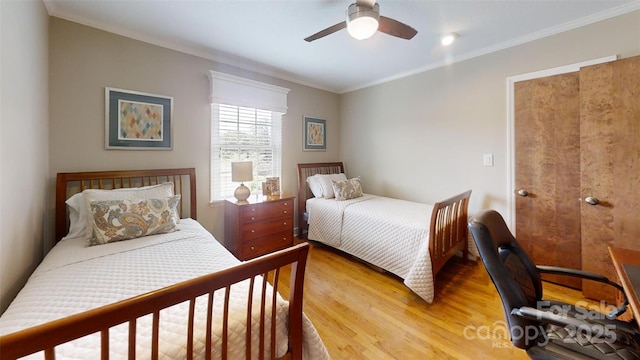 1695 Arden Dr, Lincolnton, NC 28092 - bedroom with light wood-type flooring, crown molding, and a ceiling fan