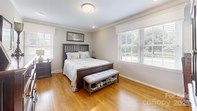 1695 Arden Dr, Lincolnton, NC 28092 - bedroom featuring multiple windows, light wood-type flooring, and ornamental molding