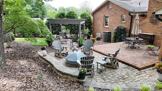 1695 Arden Dr, Lincolnton, NC 28092 - view of patio / terrace featuring an outdoor fire pit and outdoor dining space