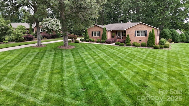 1695 Arden Dr, Lincolnton, NC 28092 - single story home with a front lawn and brick siding