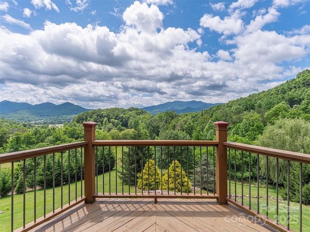 80 Feather Ln, Waynesville, NC 28786 - deck featuring a mountain view, a wooded view, and a lawn