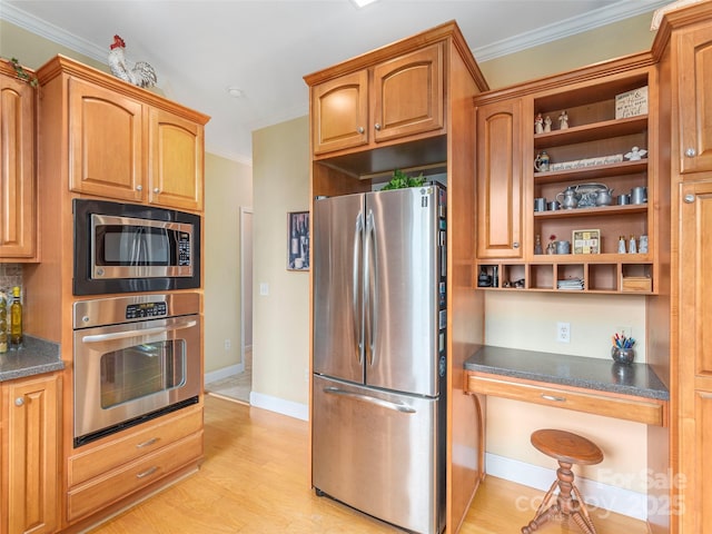 80 Feather Ln, Waynesville, NC 28786 - kitchen with appliances with stainless steel finishes, open shelves, dark countertops, and ornamental molding