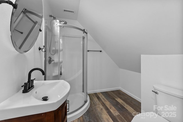15400 Groveland St, Huntersville, NC 28078 - full bath featuring a stall shower, wood finished floors, lofted ceiling, and vanity