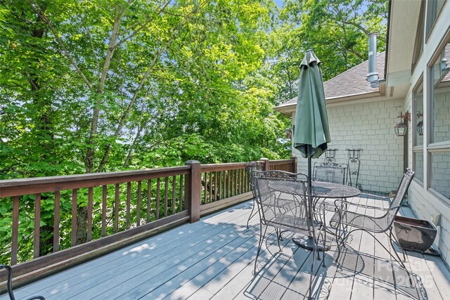 102 Coyote Rdg, Maggie Valley, NC 28751 - wooden terrace featuring outdoor dining area