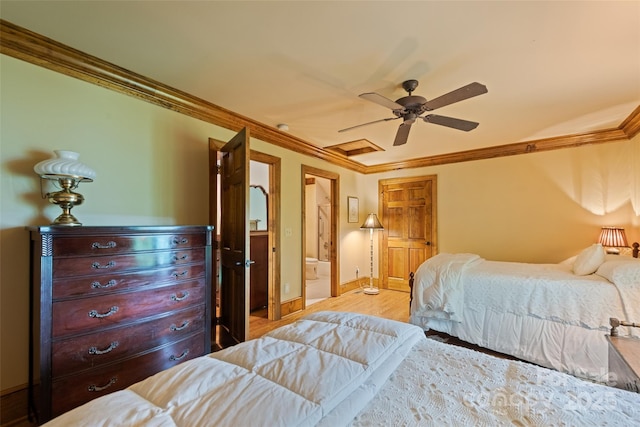 102 Coyote Rdg, Maggie Valley, NC 28751 - bedroom with ornamental molding, wood finished floors, ensuite bath, baseboards, and ceiling fan
