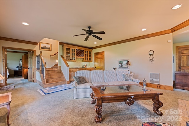 102 Coyote Rdg, Maggie Valley, NC 28751 - living area featuring ornamental molding, light carpet, recessed lighting, ceiling fan, and stairs