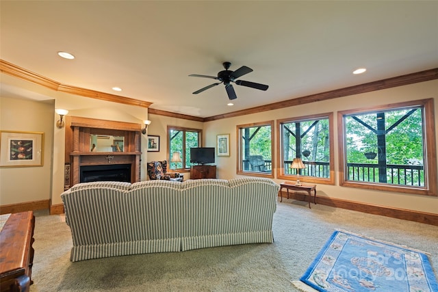 102 Coyote Rdg, Maggie Valley, NC 28751 - living area with ornamental molding, carpet floors, a fireplace, a ceiling fan, and baseboards