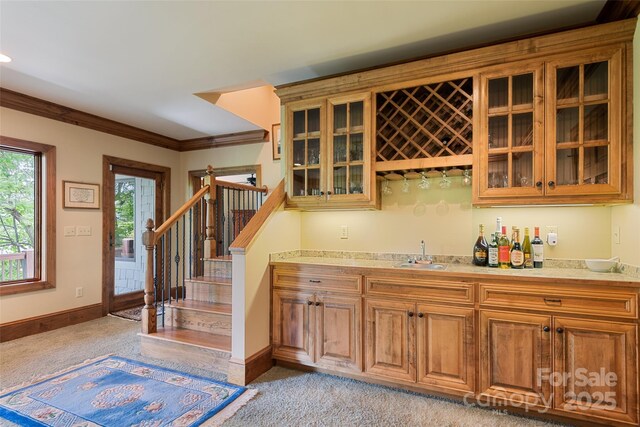 102 Coyote Rdg, Maggie Valley, NC 28751 - indoor bar featuring light colored carpet, baseboards, ornamental molding, and stairway
