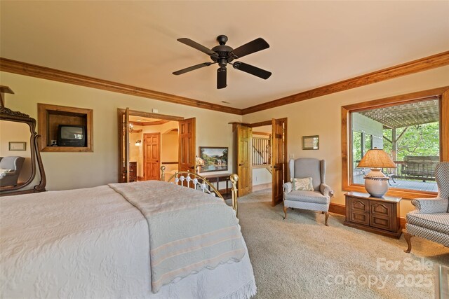 102 Coyote Rdg, Maggie Valley, NC 28751 - bedroom with carpet, crown molding, a ceiling fan, and baseboards