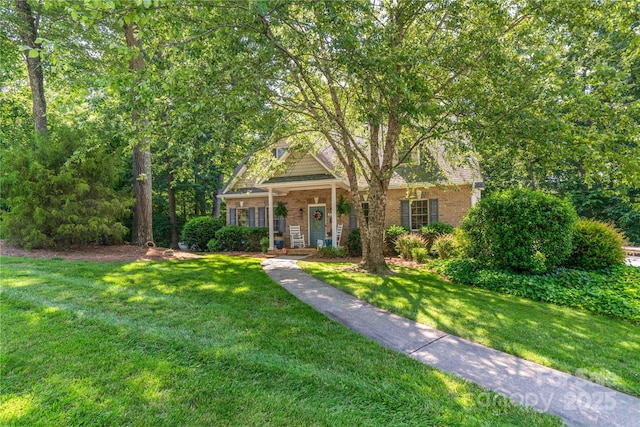 333 Garden Valley Dr, Winston Salem, NC 27107 - view of front of house featuring brick siding and a front yard