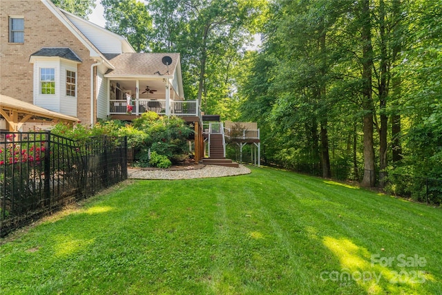 333 Garden Valley Dr, Winston Salem, NC 27107 - fenced backyard featuring a ceiling fan, stairway, and a deck