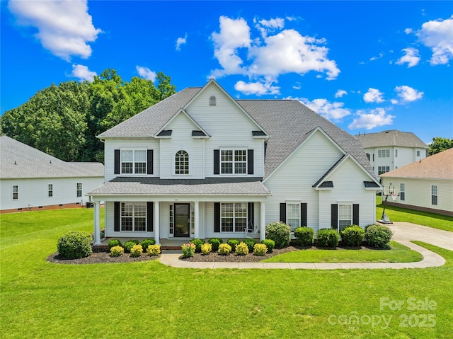 112 Doyle Farm Ln, Mooresville, NC 28115 - traditional home with a porch, a front lawn, and a shingled roof