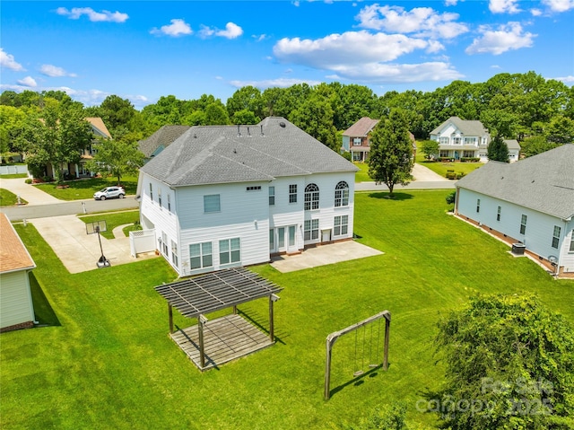 112 Doyle Farm Ln, Mooresville, NC 28115 - back of property featuring a patio, a residential view, a yard, and a shingled roof