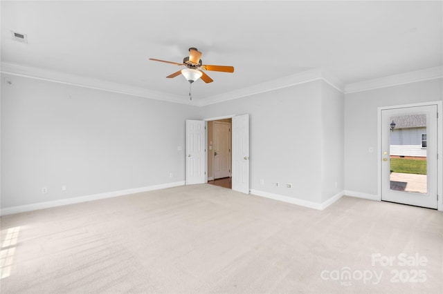 112 Doyle Farm Ln, Mooresville, NC 28115 - spare room featuring crown molding, a ceiling fan, light colored carpet, and baseboards