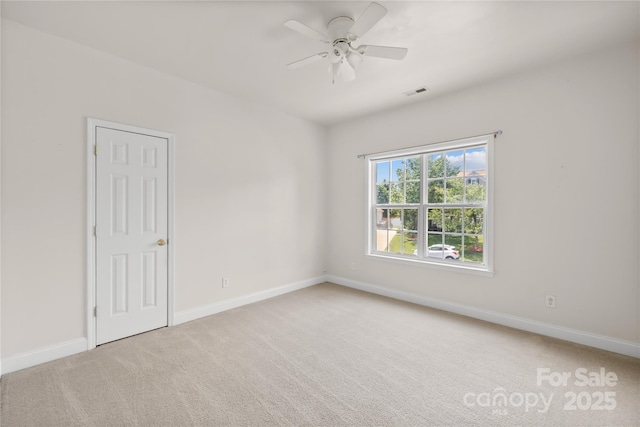 112 Doyle Farm Ln, Mooresville, NC 28115 - empty room featuring carpet floors, a ceiling fan, and baseboards