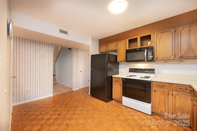 3221 5th Street Ct NW, Hickory, NC 28601 - kitchen featuring black appliances, light countertops, baseboards, and brown cabinetry