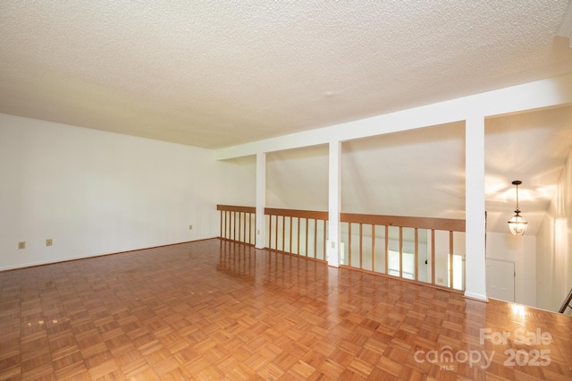 3221 5th Street Ct NW, Hickory, NC 28601 - unfurnished room featuring baseboards and a textured ceiling
