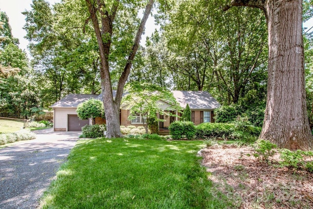 928 Tally Ho Ct, Charlotte, NC 28212 - ranch-style house featuring gravel driveway, a garage, and a front yard