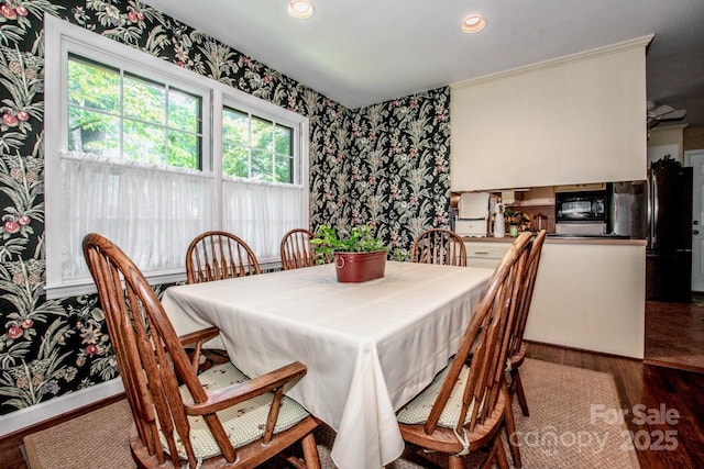 928 Tally Ho Ct, Charlotte, NC 28212 - dining space with wallpapered walls, wood finished floors, and recessed lighting