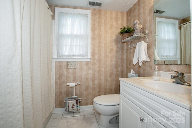 928 Tally Ho Ct, Charlotte, NC 28212 - full bath with vanity, tile patterned flooring, and a shower with curtain