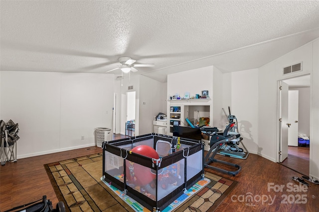 14 Luckenbach Dr, Fairview, NC 28730 - home office with ceiling fan, wood finished floors, a textured ceiling, and baseboards