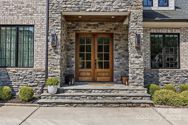 5638 Timber Ln, Charlotte, NC 28270 - view of exterior entry featuring french doors and stone siding